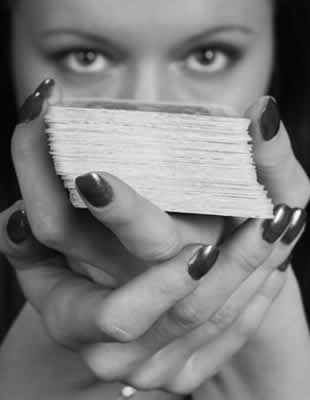 Psychic Holding Tarot Cards